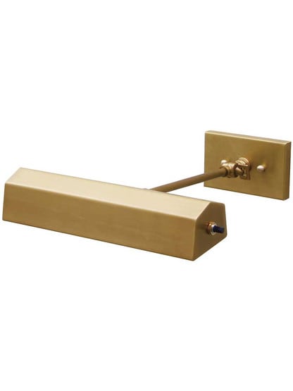 Regan Direct-Wire Picture Light in Weathered Brass.